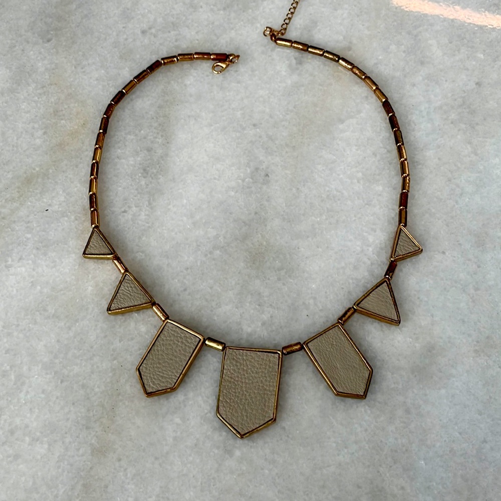 Faux leather and gold costume jewelry necklace